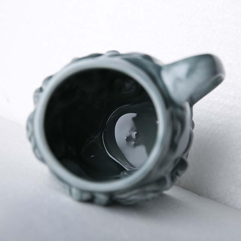 كوب خزفي من الخزف برأس ديفيد