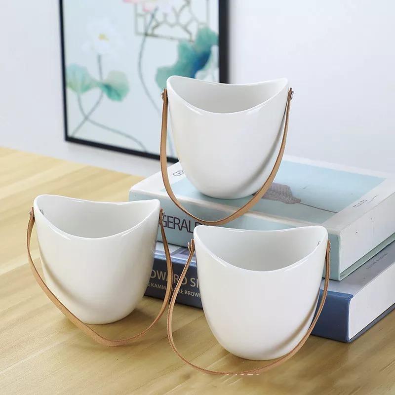 أواني زراعة معلقة من السيراميك