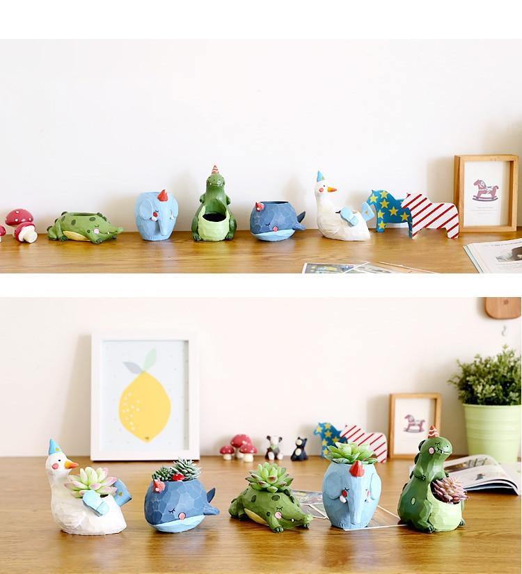 أصيص نباتات عصارية على شكل حيوان كرتوني