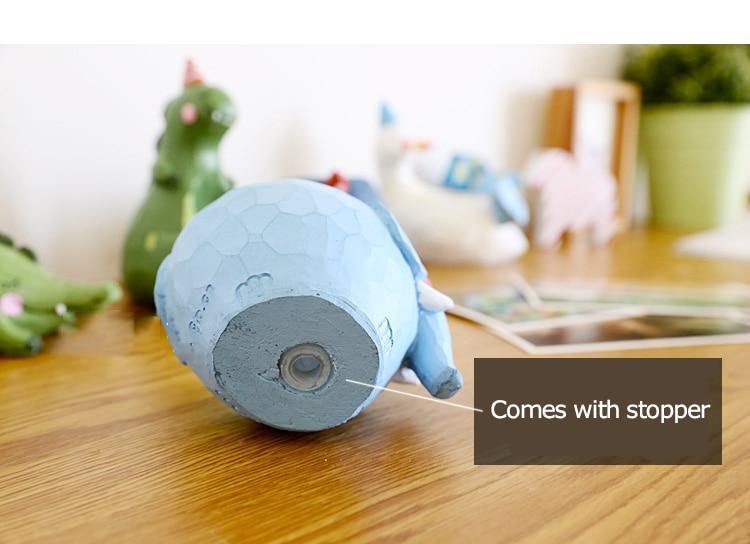 أصيص نباتات عصارية على شكل حيوان كرتوني