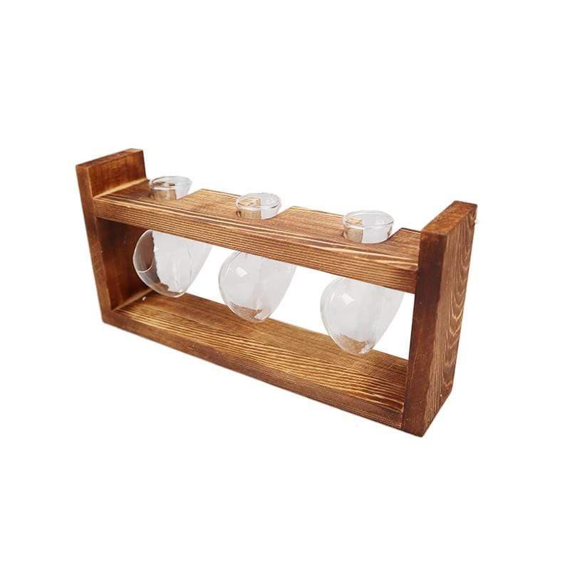 مزهرية زجاجية وخشبية على شكل قلب